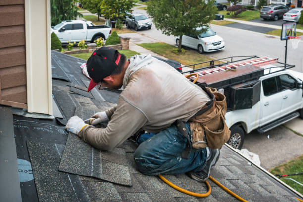 Professional Roofing technician working in Hinton, OK